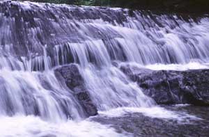 A waterfall that inclination is gentle and to flow to slip down rock board